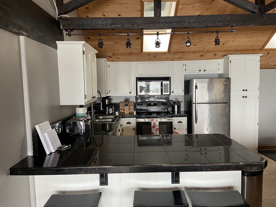 kitchen and breakfast bar on main floor