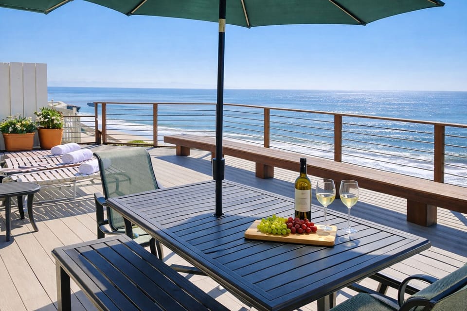 Expansive oceanfront deck perfect for lounging, dining, and soaking in views