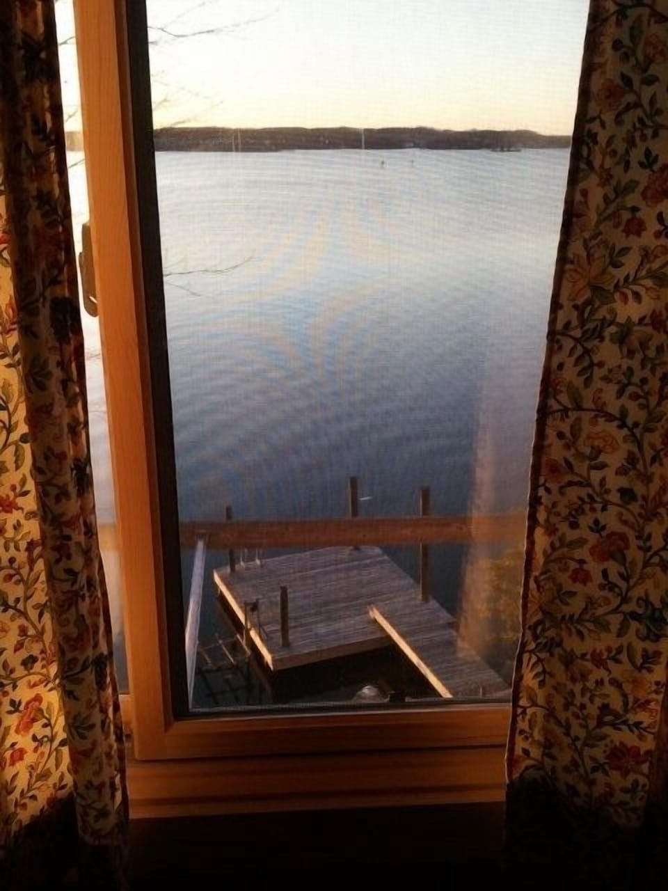 View of dock from upstairs Lakeview bedroom (at Sunset)