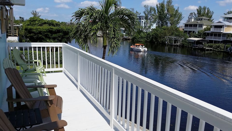 REAR TOP DECK: View from relaxing rear deck overlooking Fish Trap Bay
