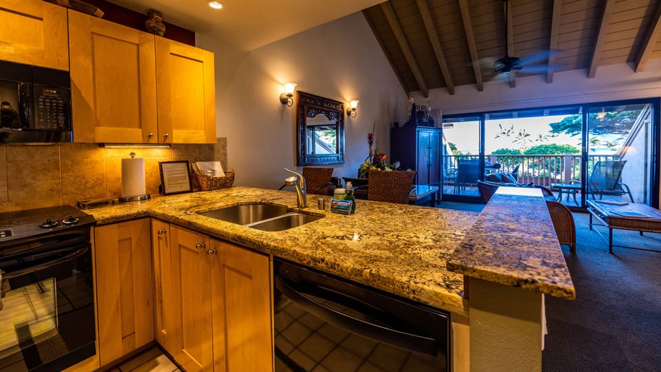 Kitchen with counter top stools for eating and conversation!