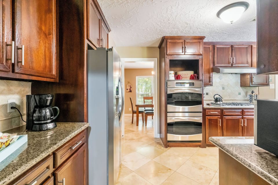 Just inside front door looking through kitchen to dining room