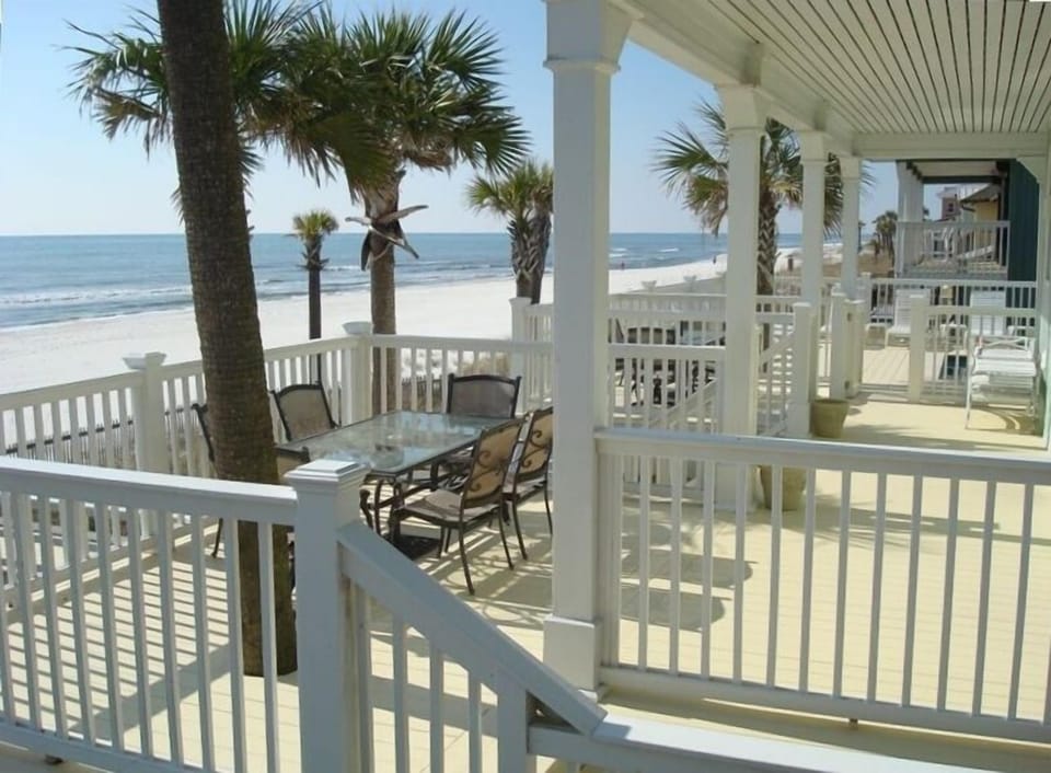 wrap around deck w/two large dining areas w/sitting for 16