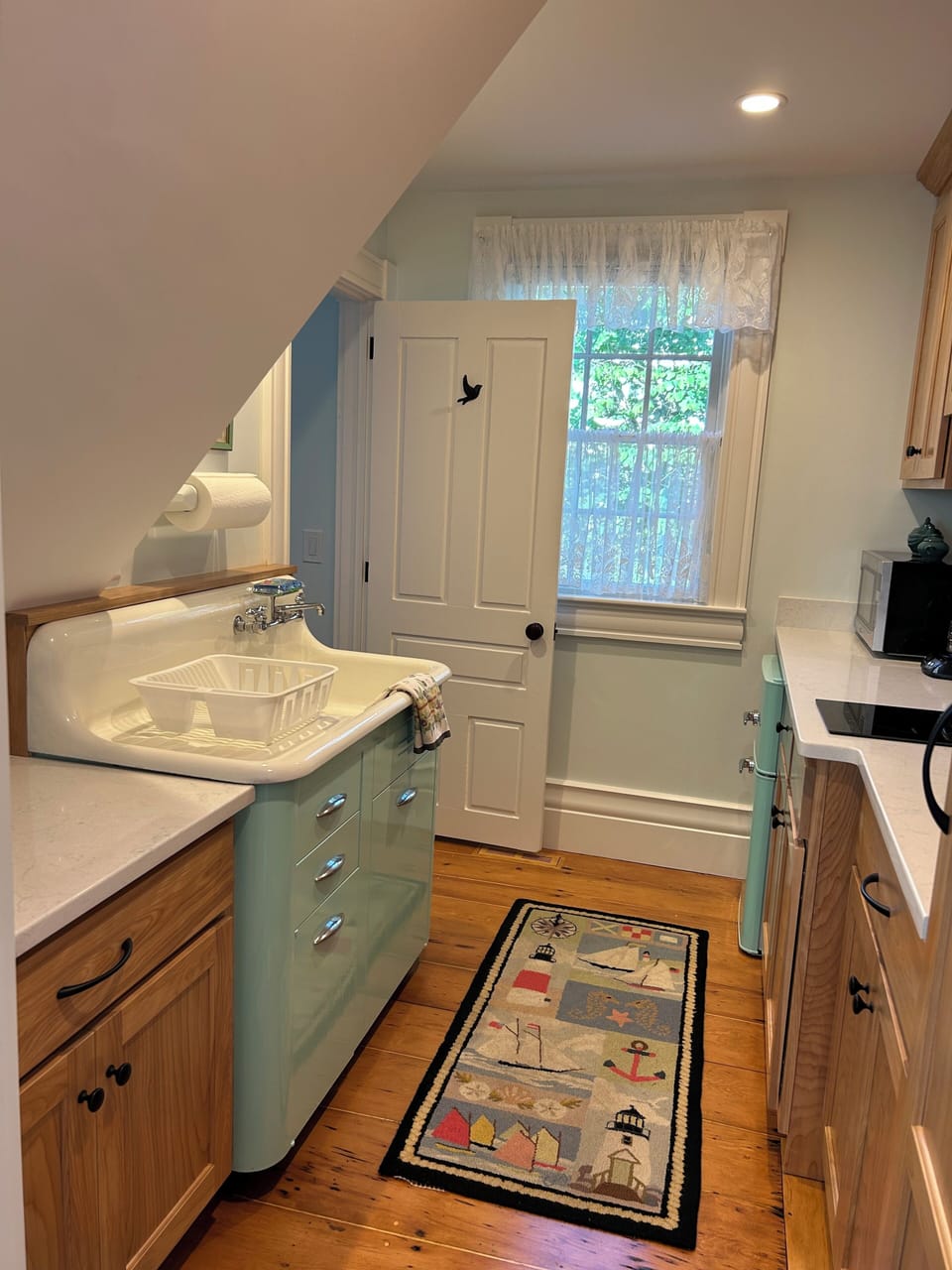 Charming kitchen with original porcelain sink with drainboard
