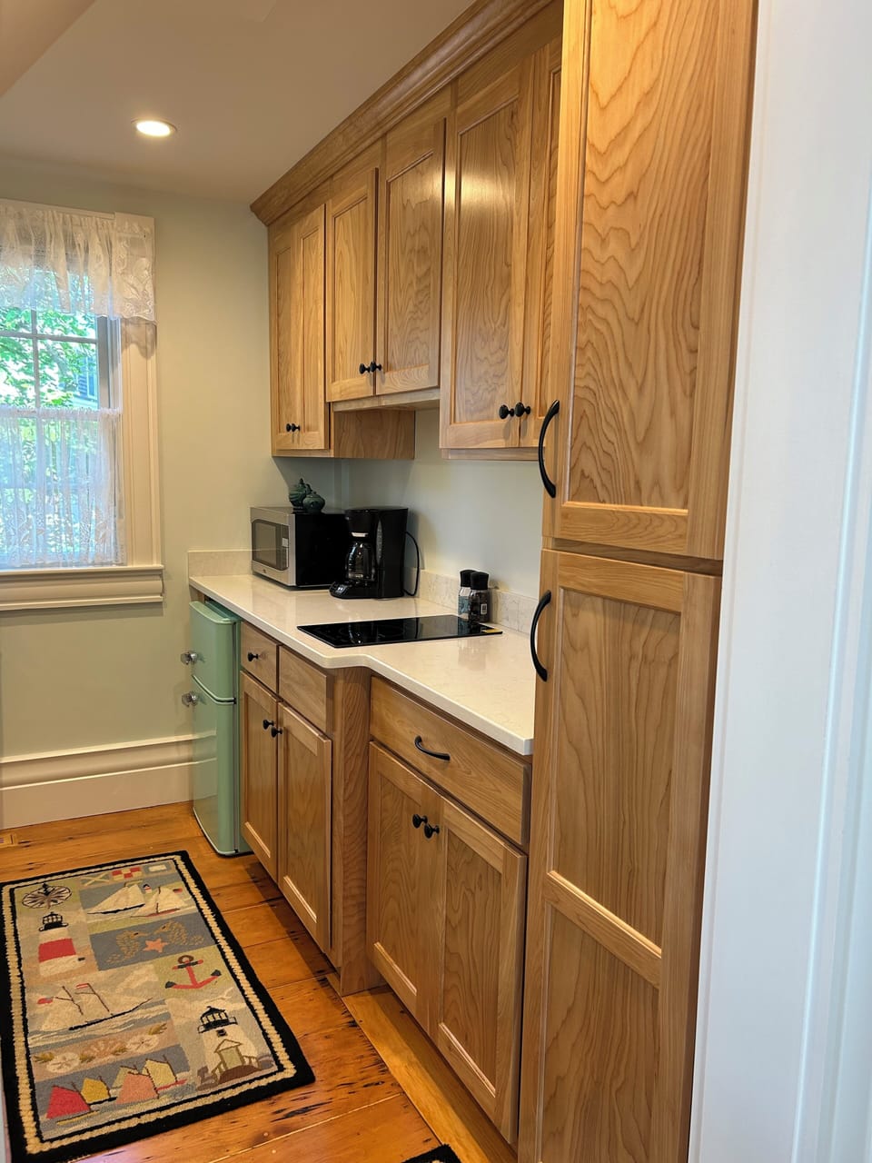 Plenty of counter and cabinet space; two burner induction stovetop
