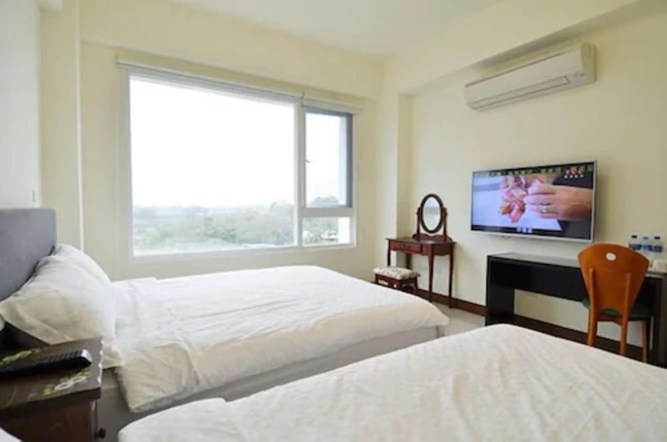 Triple Room | Desk, blackout drapes, free WiFi, bed sheets