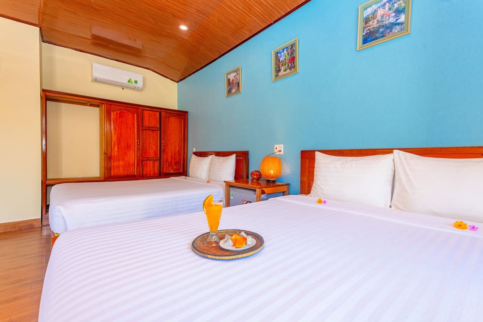 Deluxe Family Room | Minibar, desk, soundproofing, iron/ironing board