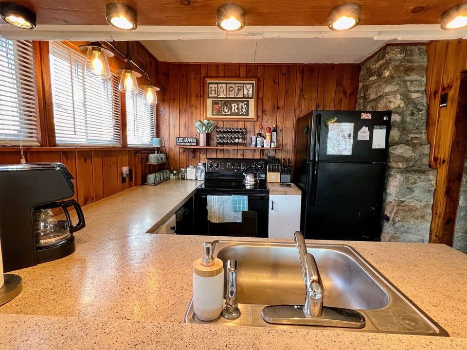 Fully stocked kitchen includes a coffee maker that makes k-cups or a full pot.