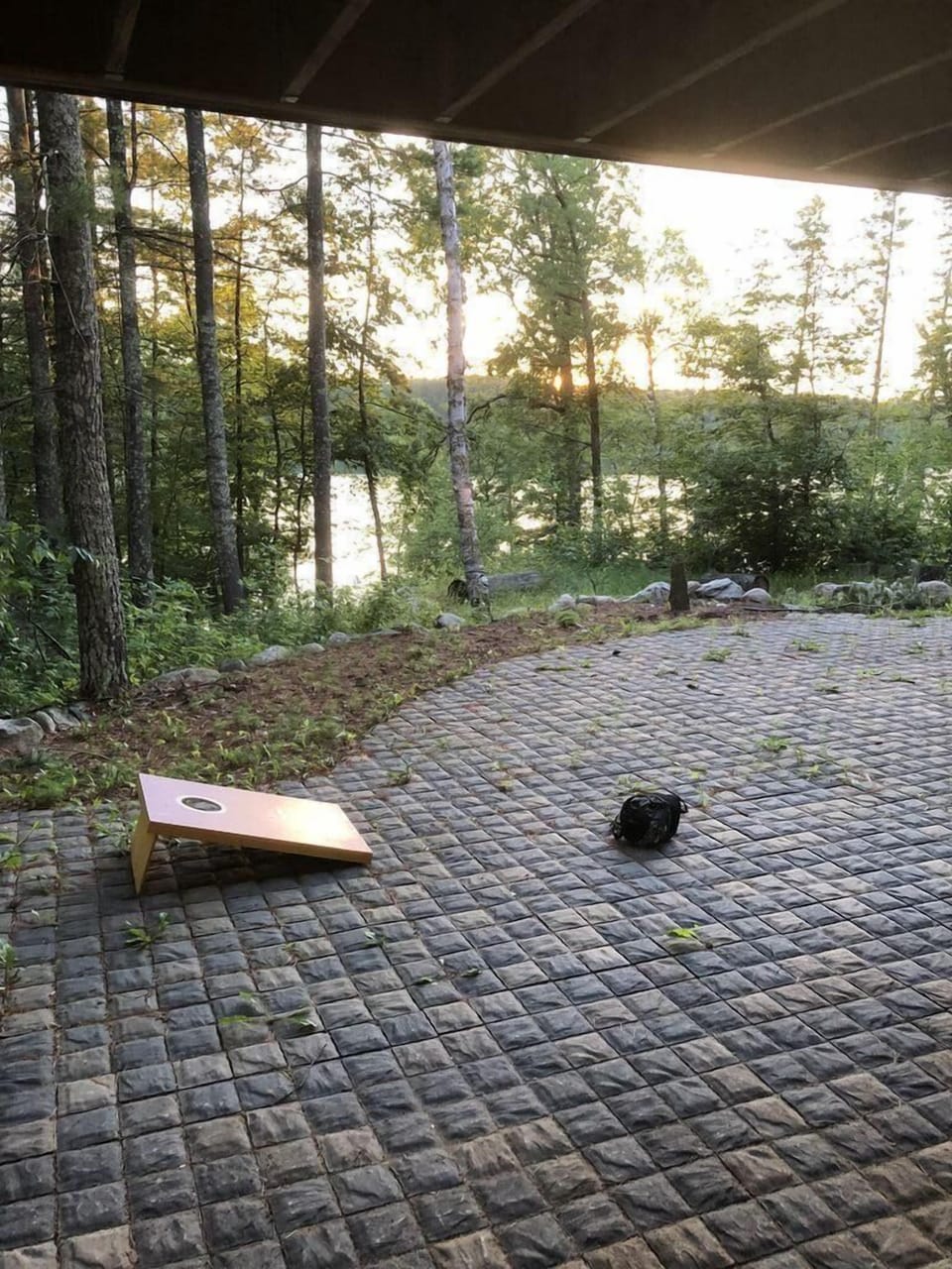 Patio is a great place to enjoy the views of the lake and play some bags. 