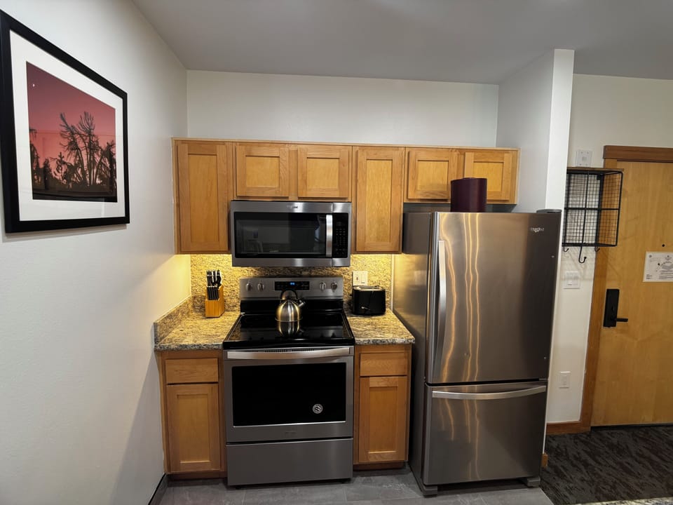 Full-size refrigerator, range, microwave and dishwasher