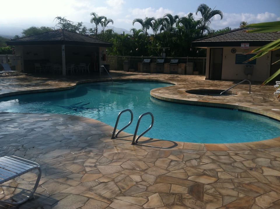 One of our warm and inviting pools and hot tubs, gas bbqs, and bathrooms.