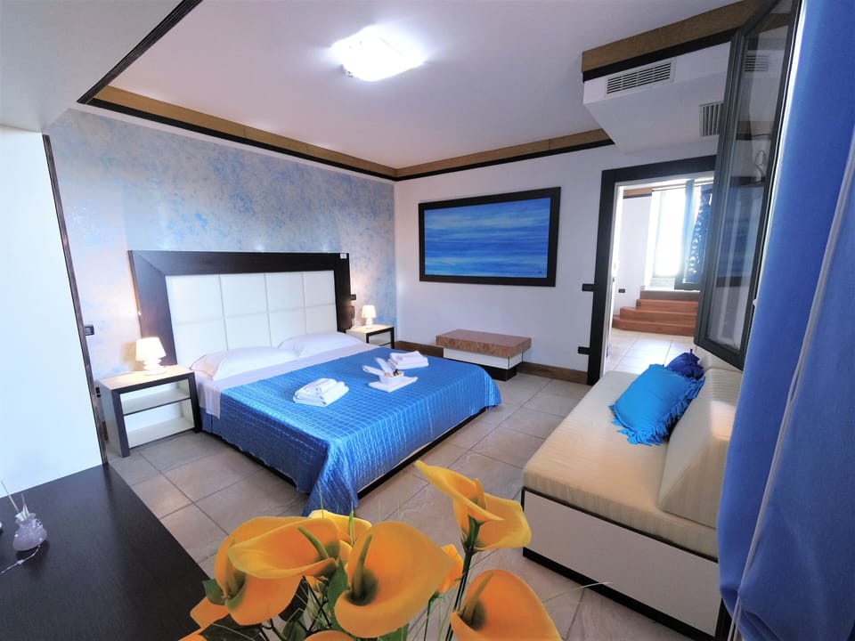 Panoramic Suite, Sea View, Sea Facing | Minibar, desk, laptop workspace, soundproofing