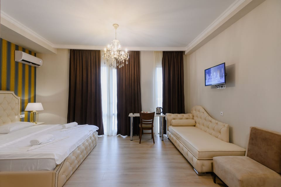 Deluxe Double Room (with veranda) | Minibar, in-room safe, desk, blackout drapes