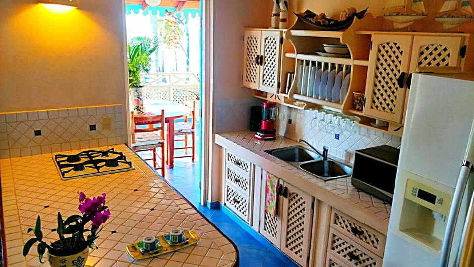 Family Apartment, 3 Bedrooms, Beach View, Beachfront | Private kitchen | Fridge, microwave, coffee/tea maker, toaster