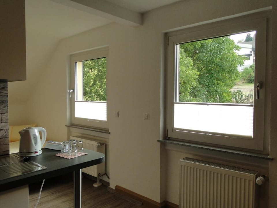 Desk, laptop workspace, free WiFi, bed sheets