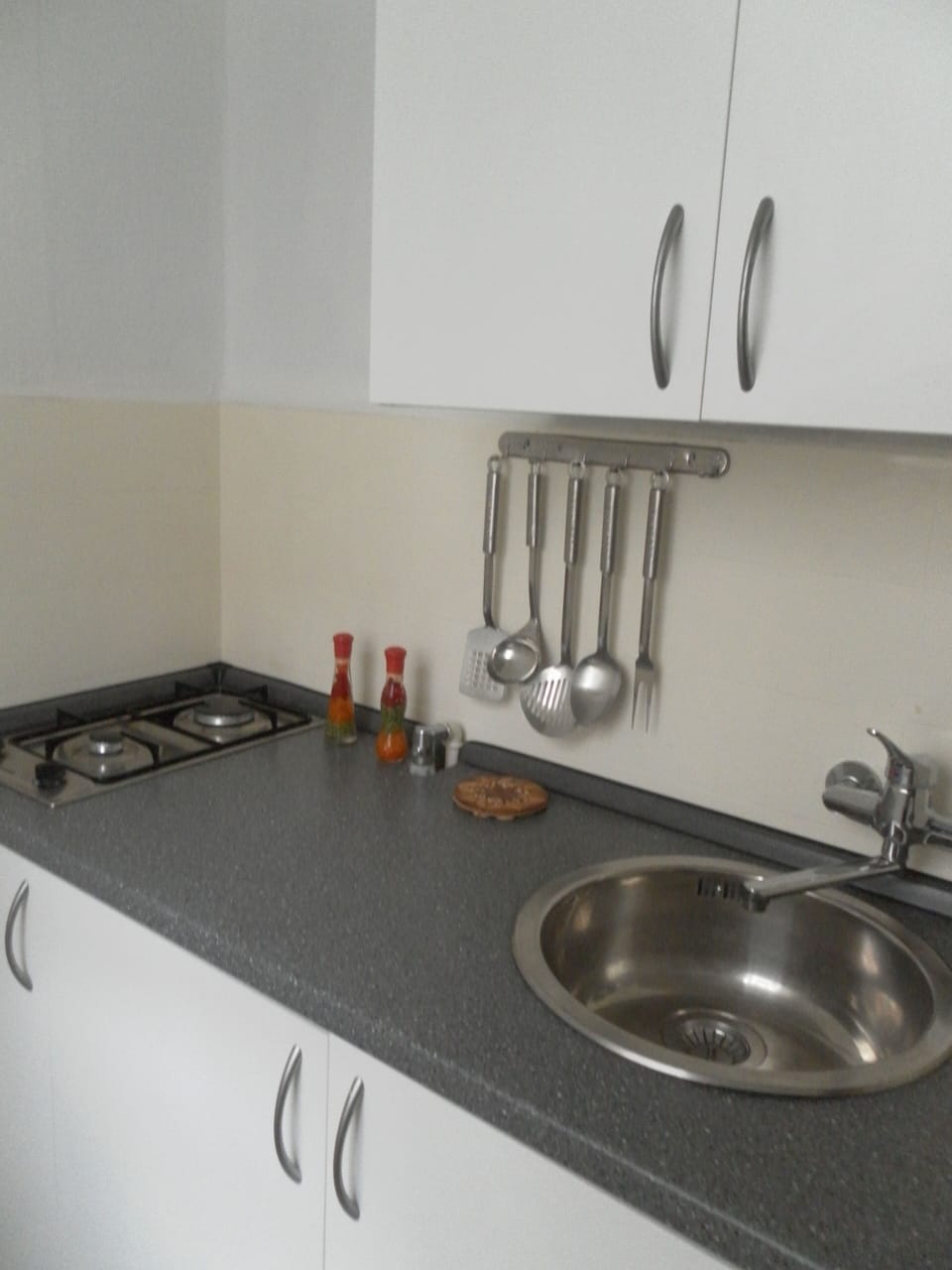 Apartment, Balcony | Private kitchen | Fridge, microwave, stovetop, coffee/tea maker