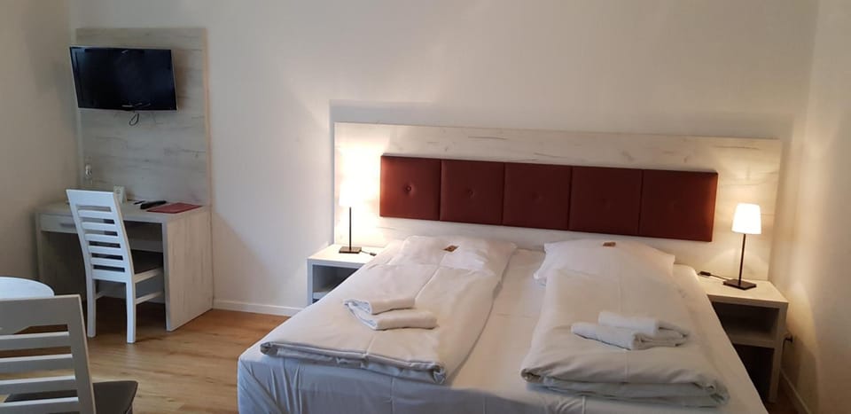 Desk, free WiFi, bed sheets
