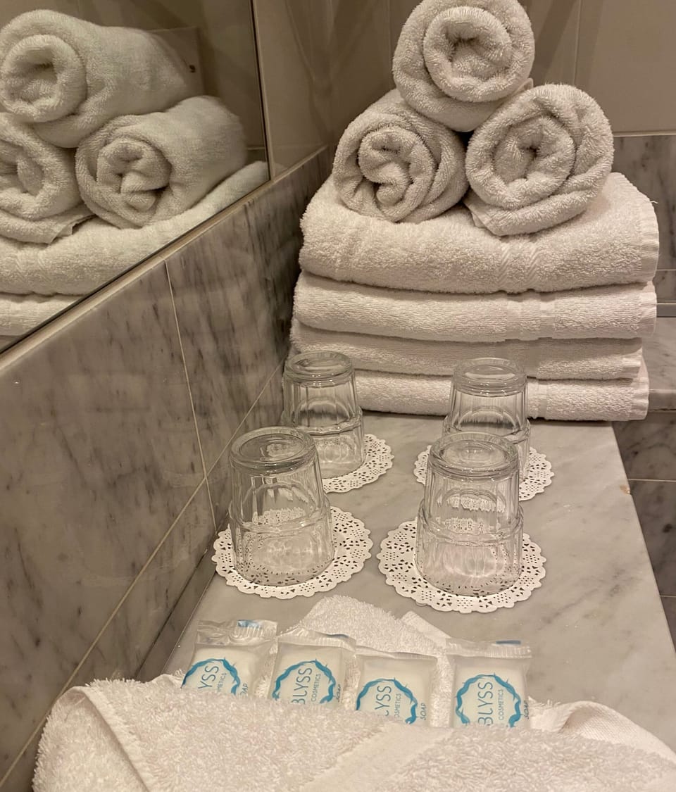 Shower, free toiletries, hair dryer, towels