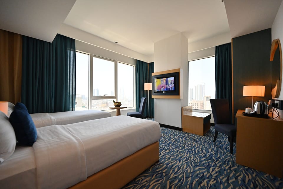 Standard Double or Twin Room | Minibar, in-room safe, desk, laptop workspace