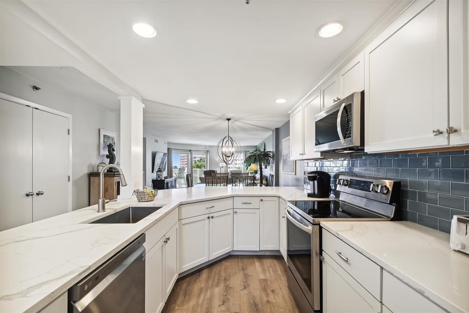 Condo, 2 Bedrooms | Private kitchen | Fridge, microwave, oven, dishwasher