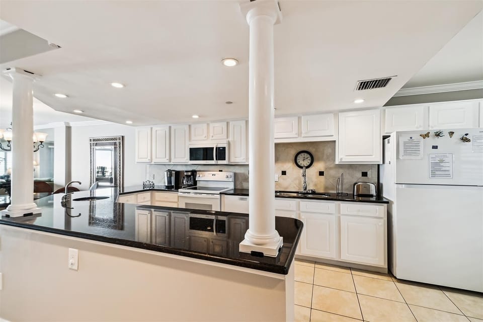 Condo, 2 Bedrooms | Private kitchen | Fridge, microwave, oven, dishwasher