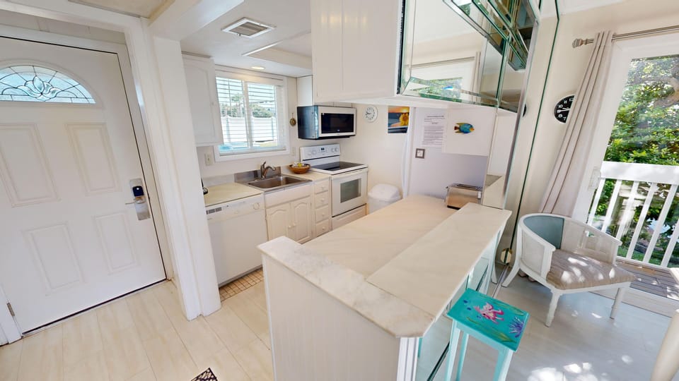 Condo, 2 Bedrooms | Private kitchen | Fridge, microwave, oven, dishwasher