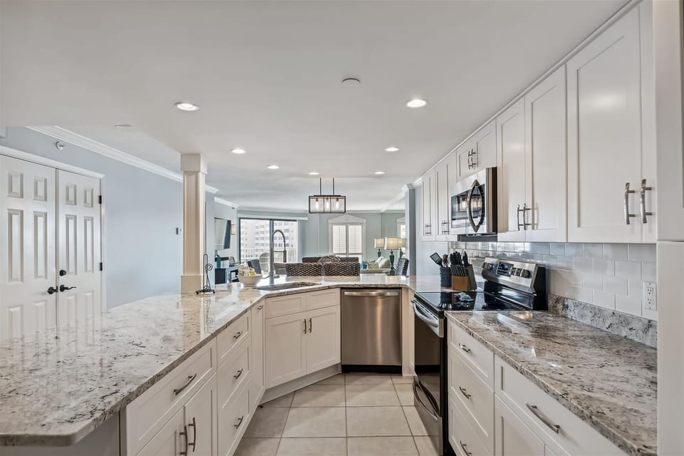Condo, 2 Bedrooms | Private kitchen | Coffee/tea maker, fridge, microwave, oven