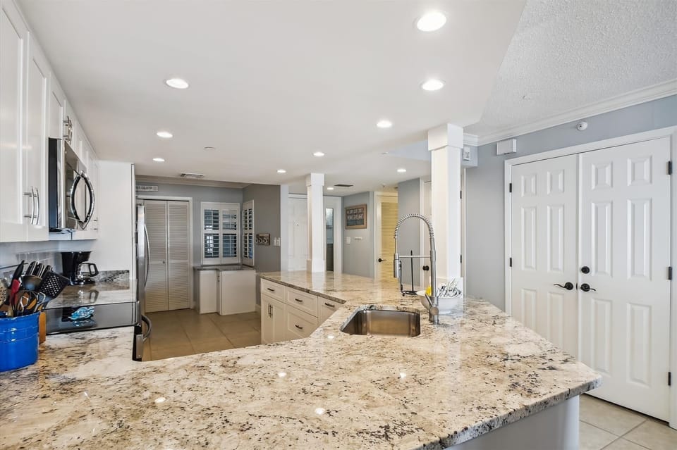 Condo, 2 Bedrooms | Private kitchen | Fridge, microwave, oven, dishwasher