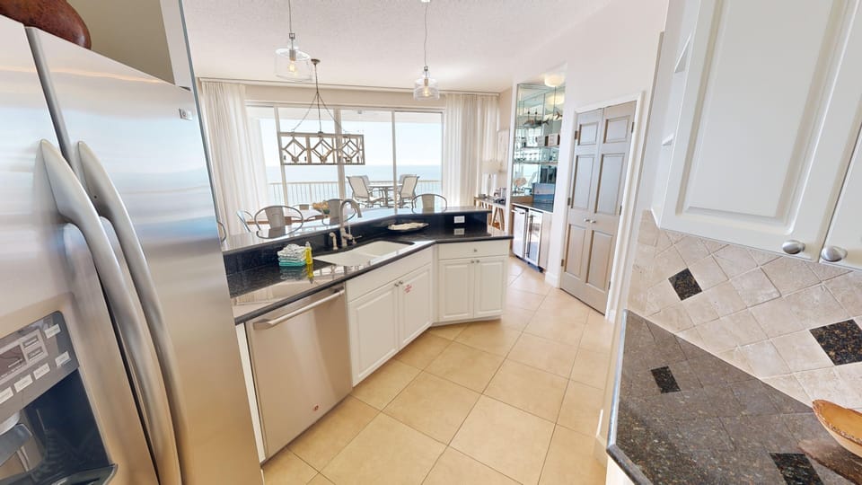 Condo, 3 Bedrooms | Private kitchen | Fridge, microwave, oven, dishwasher