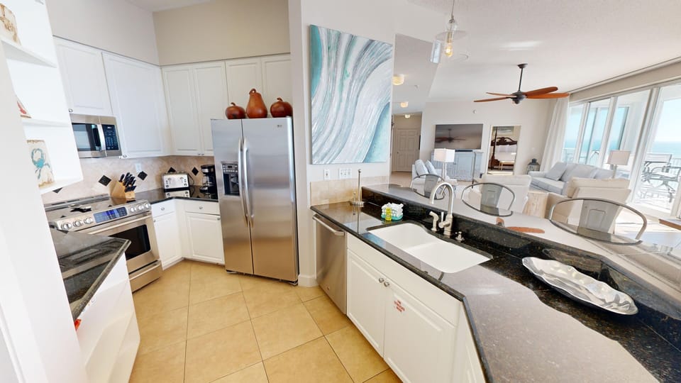 Condo, 3 Bedrooms | Private kitchen | Fridge, microwave, oven, dishwasher