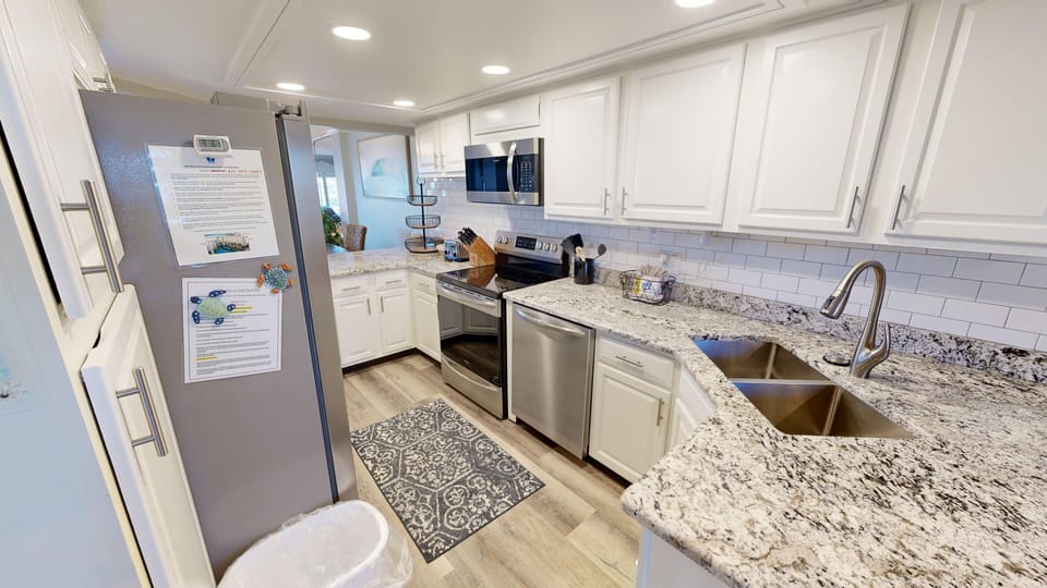Condo, 2 Bedrooms | Private kitchen | Fridge, microwave, oven, dishwasher