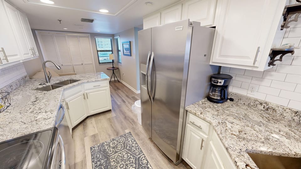 Condo, 2 Bedrooms | Private kitchen | Fridge, microwave, oven, dishwasher