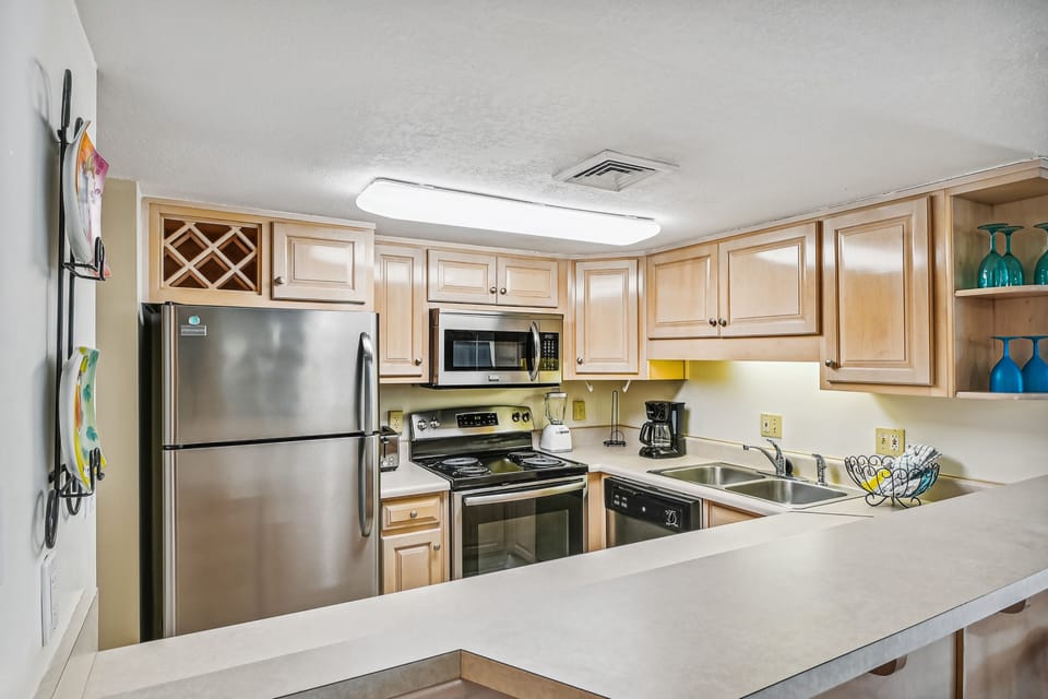 Condo, 2 Bedrooms | Private kitchen | Coffee/tea maker, fridge, microwave, oven
