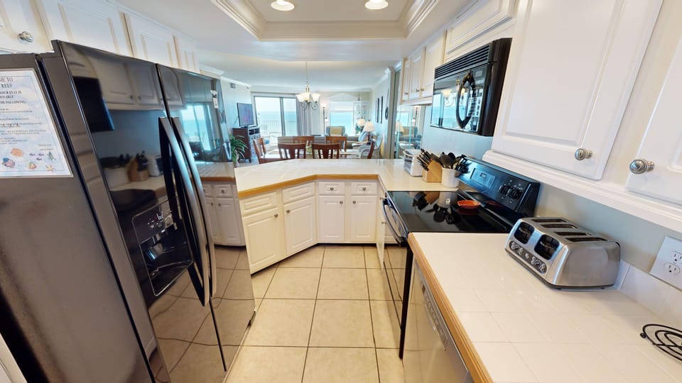Condo, 2 Bedrooms | Private kitchen | Fridge, microwave, oven, dishwasher