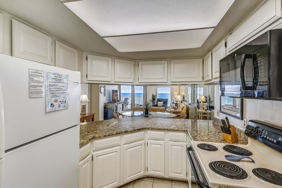 Condo, 2 Bedrooms | Private kitchen | Fridge, microwave, oven, dishwasher