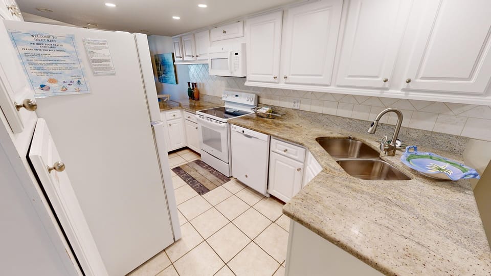 Condo, 2 Bedrooms | Private kitchen | Fridge, microwave, oven, dishwasher