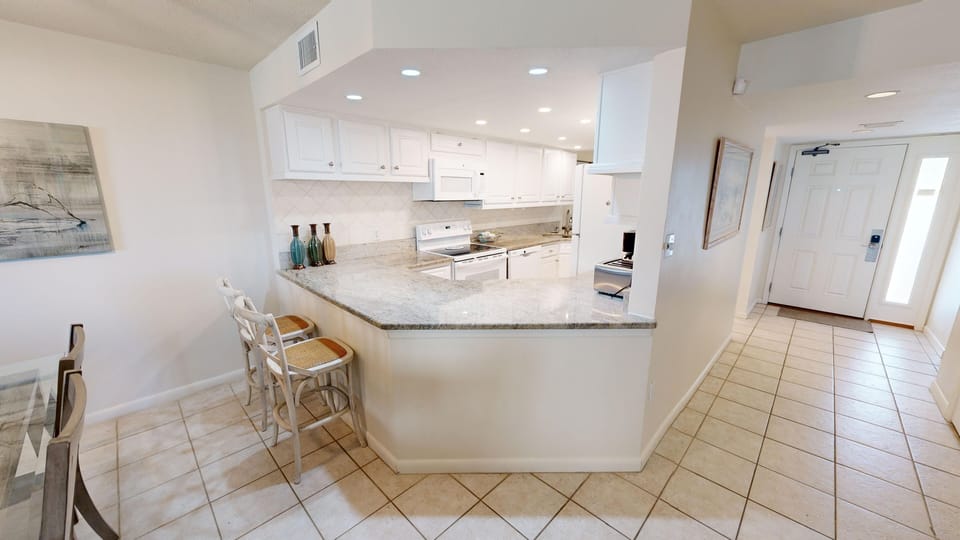 Condo, 2 Bedrooms | Private kitchen | Fridge, microwave, oven, dishwasher