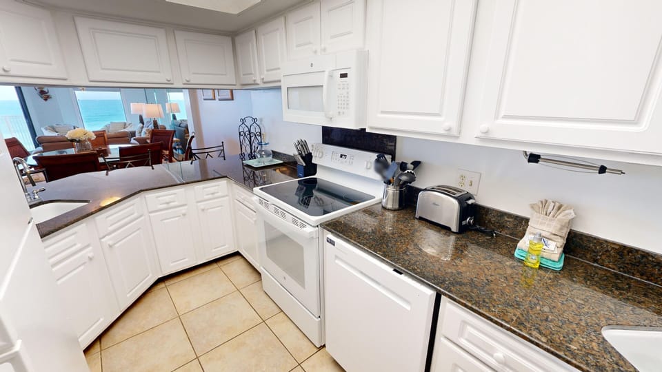 Condo, 2 Bedrooms | Private kitchen | Fridge, microwave, oven, dishwasher