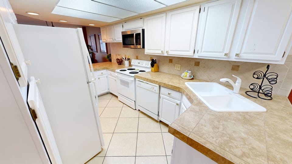 Condo, 2 Bedrooms | Private kitchen | Fridge, microwave, oven, dishwasher