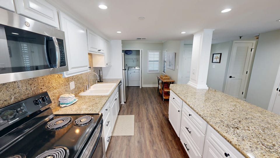 Condo, 2 Bedrooms | Private kitchen | Fridge, microwave, oven, dishwasher