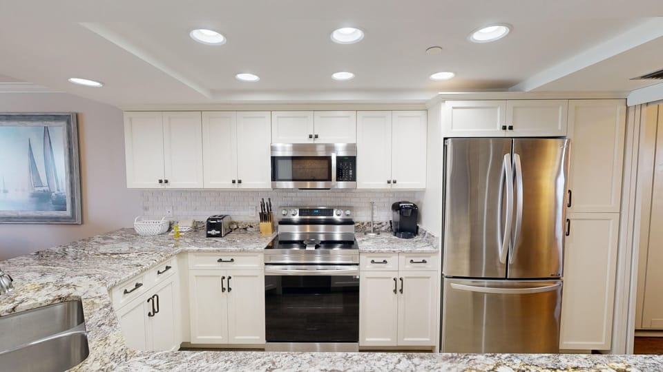 Condo, 2 Bedrooms | Private kitchen | Fridge, microwave, oven, dishwasher
