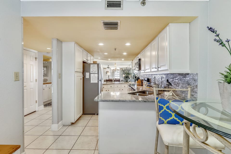 Condo, 2 Bedrooms | Private kitchen | Fridge, microwave, oven, dishwasher
