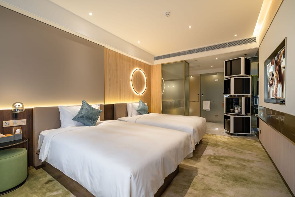 Deluxe Twin Room | Minibar, desk, blackout drapes, iron/ironing board (on request)
