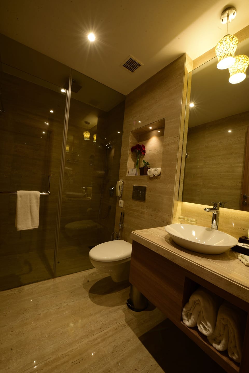 Shower, slippers, bidet, towels