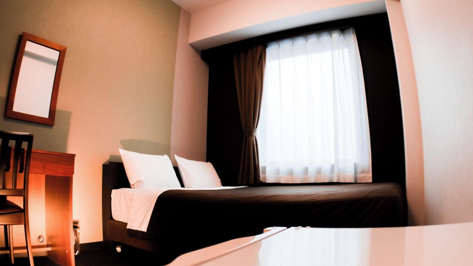 Desk, free WiFi, bed sheets