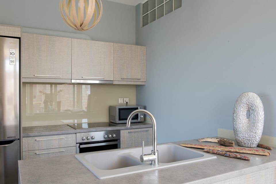 Villa | Private kitchen | Full-size fridge, microwave, oven, stovetop