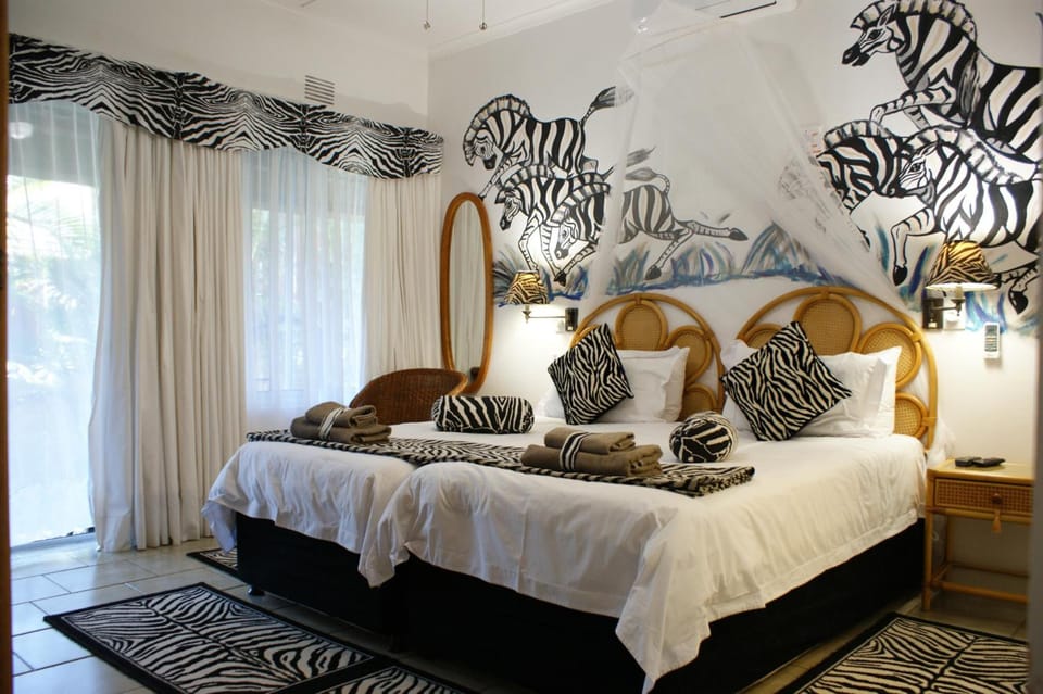 Premium bedding, in-room safe, individually decorated, blackout drapes