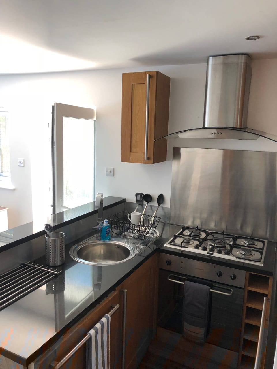 Deluxe Apartment, Multiple Beds, Non Smoking | Private kitchen | Full-size fridge, microwave, oven, stovetop