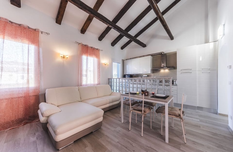 Deluxe Apartment, Multiple Beds, Non Smoking, Canal View | Living area | 40-inch flat-screen TV with digital channels, TV