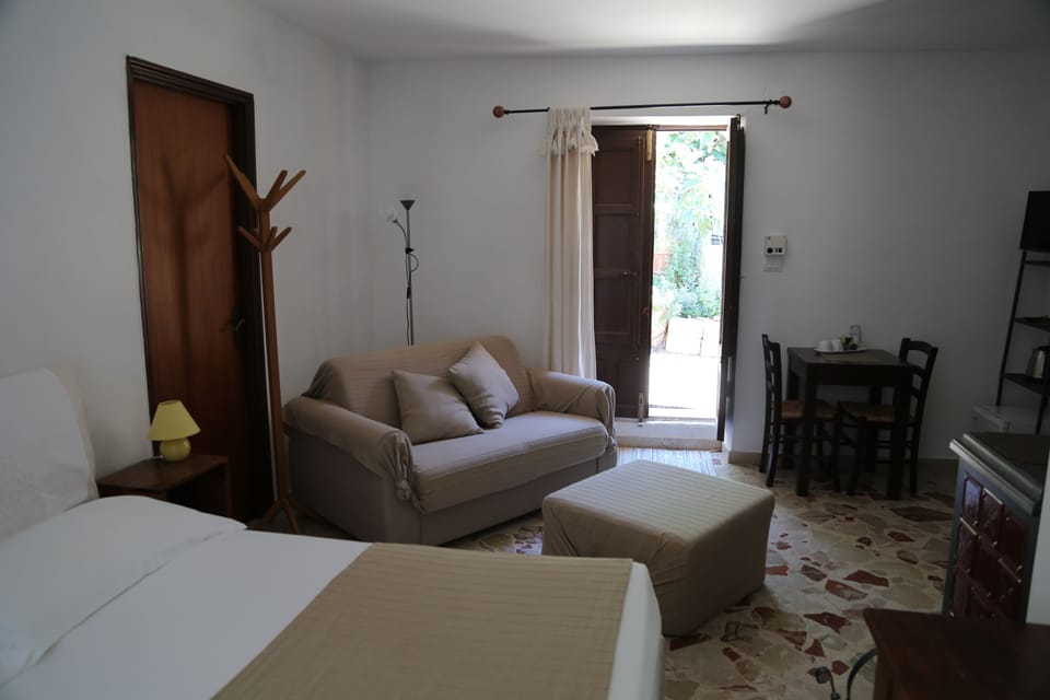Triple Room | Desk, blackout drapes, soundproofing, rollaway beds